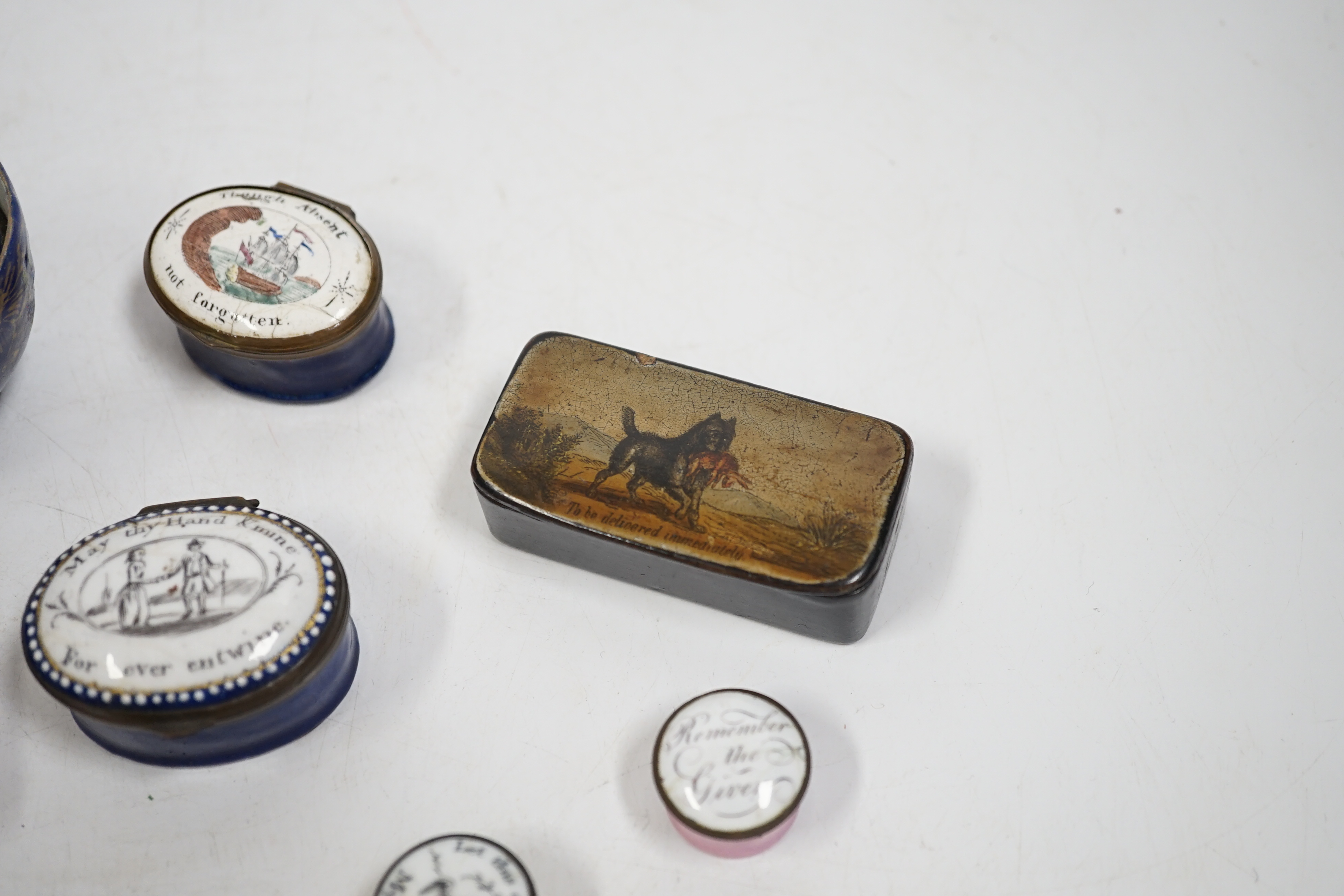 Two South Staffordshire enamel sweetheart patch boxes and two similar snuff boxes, three South Staffordshire enamel pill boxes, all late 18th/early 19th century, South Staffordshire enamel cup and associated cover and a